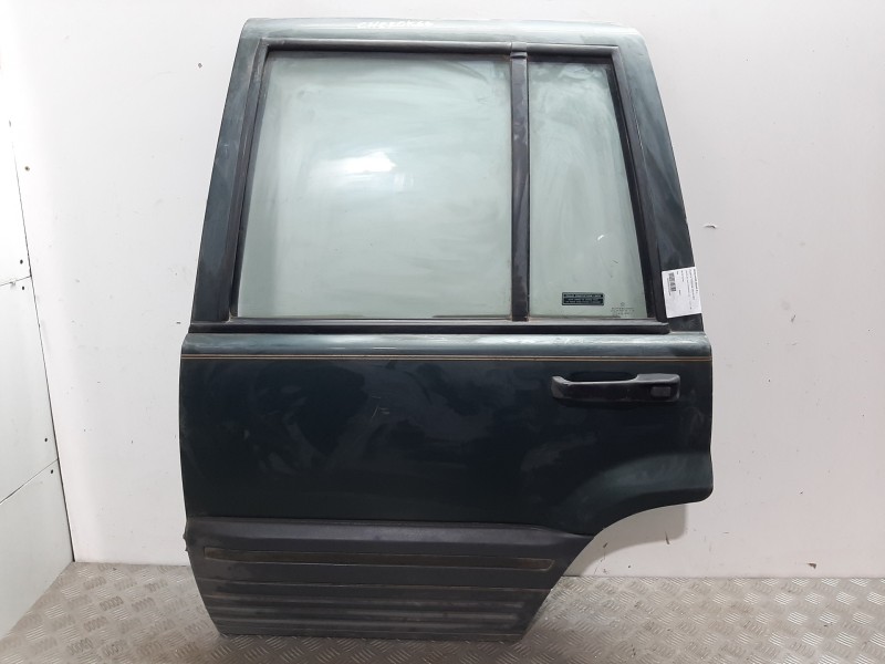 Recambio de puerta trasera izquierda para chrysler jeep cherokee (xj) referencia OEM IAM  VERDE 