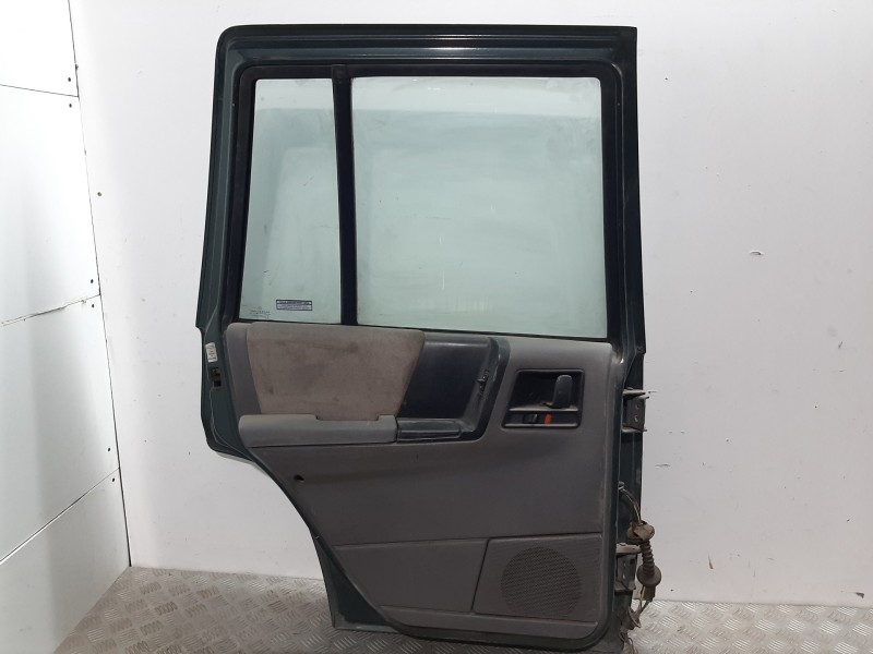 Recambio de puerta trasera izquierda para chrysler jeep cherokee (xj) referencia OEM IAM  VERDE 