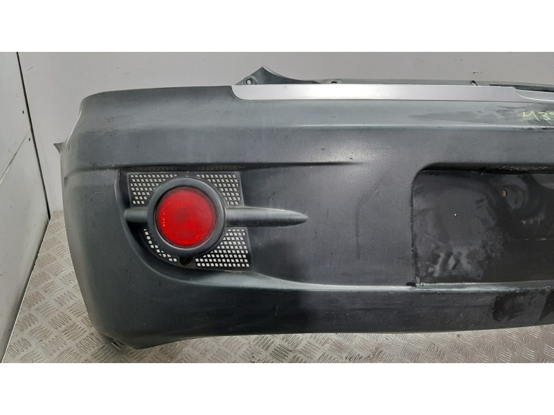 Recambio de paragolpes trasero para ssangyong actyon 200 xdi referencia OEM IAM  NEGRO 