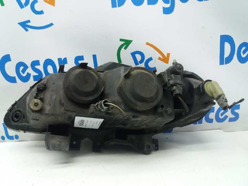 Recambio de faro derecho para renault laguna (b56) 1.9 dci rt referencia OEM IAM 7701047881  