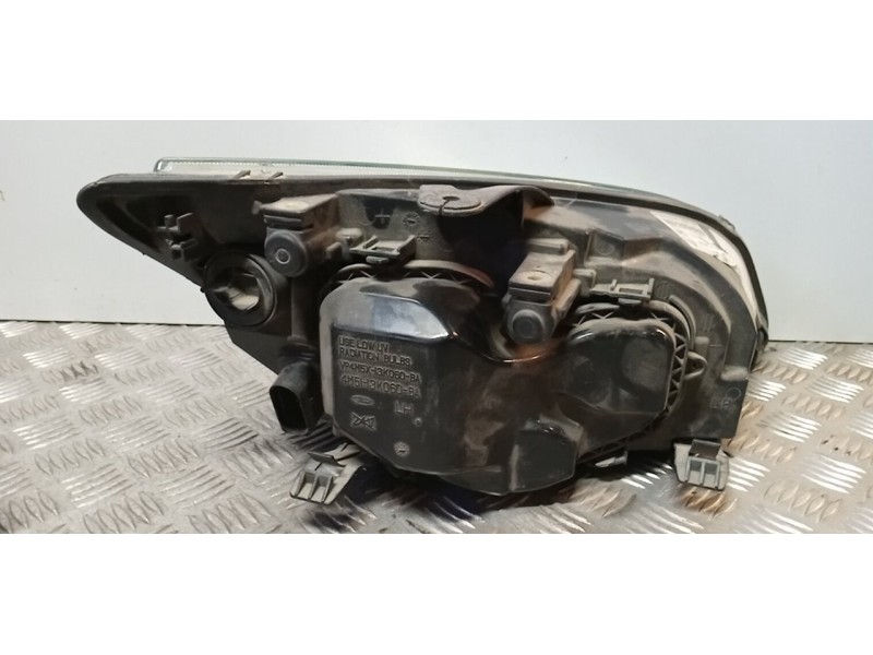 Recambio de faro izquierdo para ford focus berlina (cap) trend referencia OEM IAM 1480979  