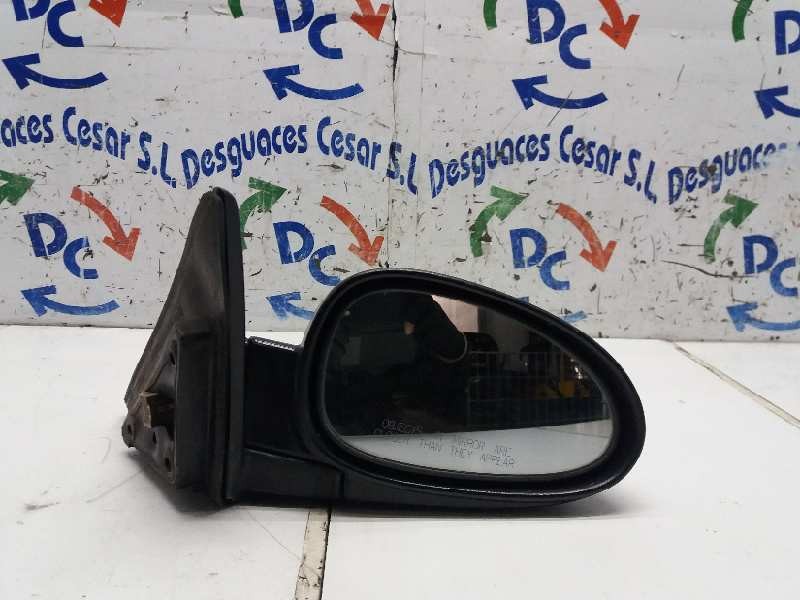 Recambio de retrovisor derecho para daewoo compact jh3/552 referencia OEM IAM  ELECTRICO NEGRO