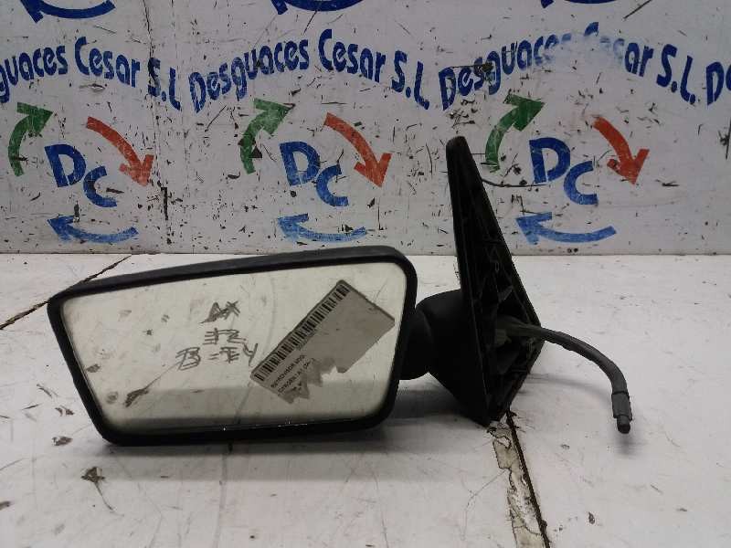 Recambio de retrovisor izquierdo para citroën ax 1.1 referencia OEM IAM  MANUAL NEGRO