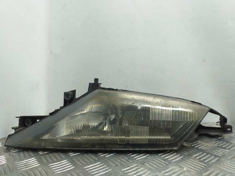 Recambio de faro izquierdo para lancia lancia y 1.1 cat referencia OEM IAM   