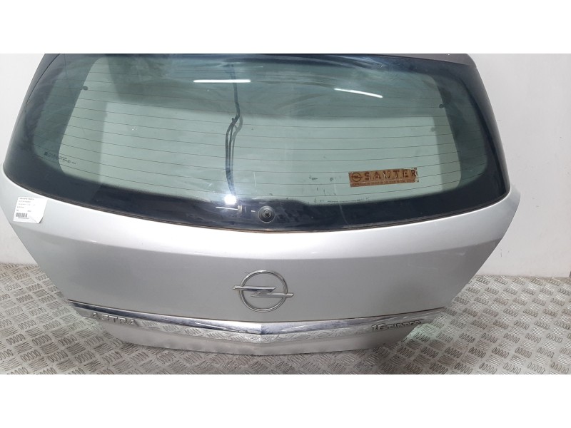 Recambio de porton trasero para opel astra gtc 1.6 16v referencia OEM IAM  PLATA 