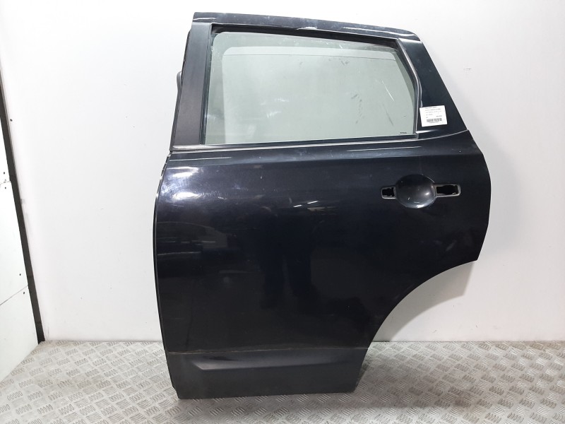 Recambio de puerta trasera izquierda para nissan qashqai (j10) tekna referencia OEM IAM  NEGRO 