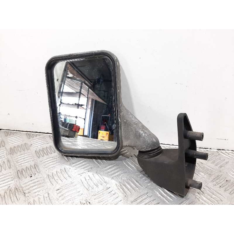 Recambio de retrovisor izquierdo para nissan trade 4/1952 referencia OEM IAM  NEGRO 