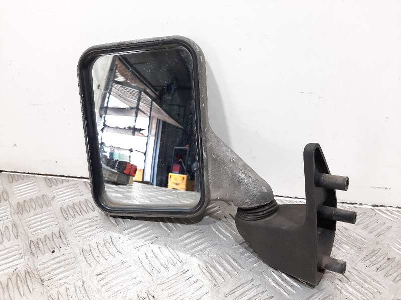Recambio de retrovisor izquierdo para nissan trade 4/1952 referencia OEM IAM  NEGRO 
