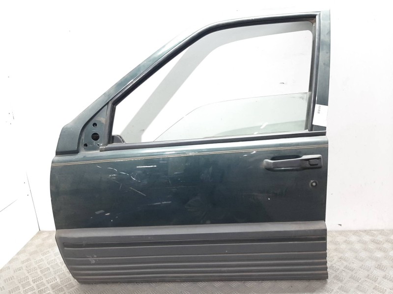 Recambio de puerta delantera izquierda para chrysler jeep cherokee (xj) referencia OEM IAM  VERDE 
