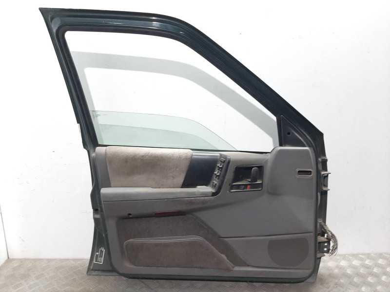 Recambio de puerta delantera izquierda para chrysler jeep cherokee (xj) referencia OEM IAM  VERDE 