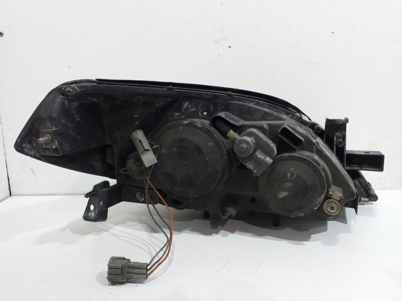 Recambio de faro izquierdo para nissan primera berlina (p12) acenta referencia OEM IAM 1EJ23801001  