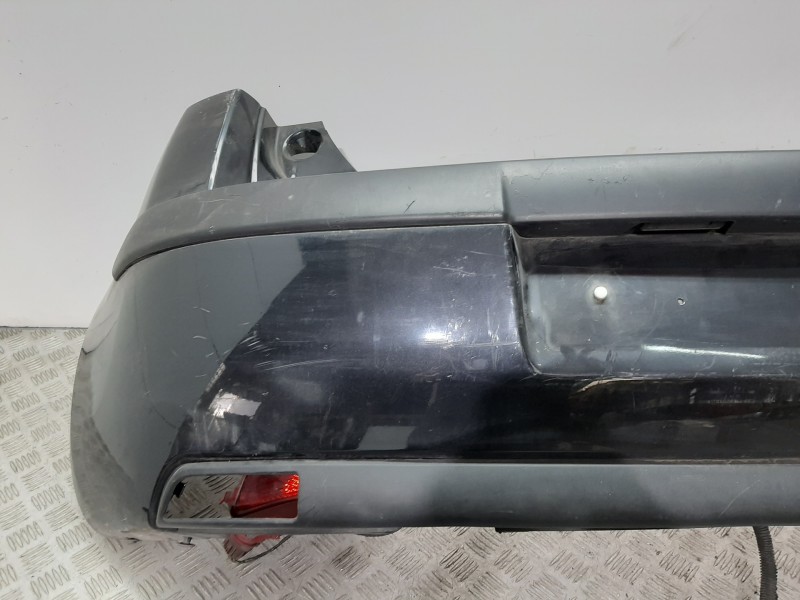 Recambio de paragolpes trasero para citroën c4 berlina sx referencia OEM IAM 7013W0  