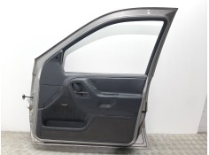 Recambio de puerta delantera derecha para chrysler jeep gr.cherokee (wj/wg) 3.1 td laredo referencia OEM IAM  GRIS  2