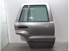 Recambio de puerta trasera derecha para chrysler jeep gr.cherokee (wj/wg) 3.1 td laredo referencia OEM IAM  GRIS 