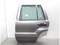 Recambio de puerta trasera izquierda para chrysler jeep gr.cherokee (wj/wg) 3.1 td laredo referencia OEM IAM  GRIS 