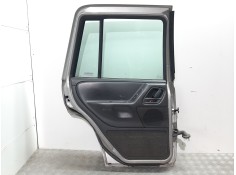 Recambio de puerta trasera izquierda para chrysler jeep gr.cherokee (wj/wg) 3.1 td laredo referencia OEM IAM  GRIS  2