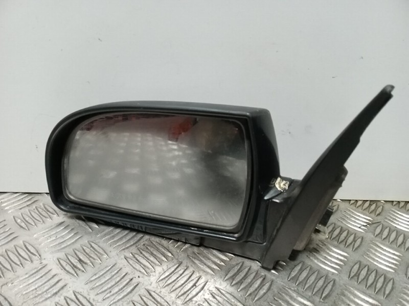 Recambio de retrovisor izquierdo para kia carens 2.0 crdi ex monovolumen referencia OEM IAM 0K2HC69180XX  