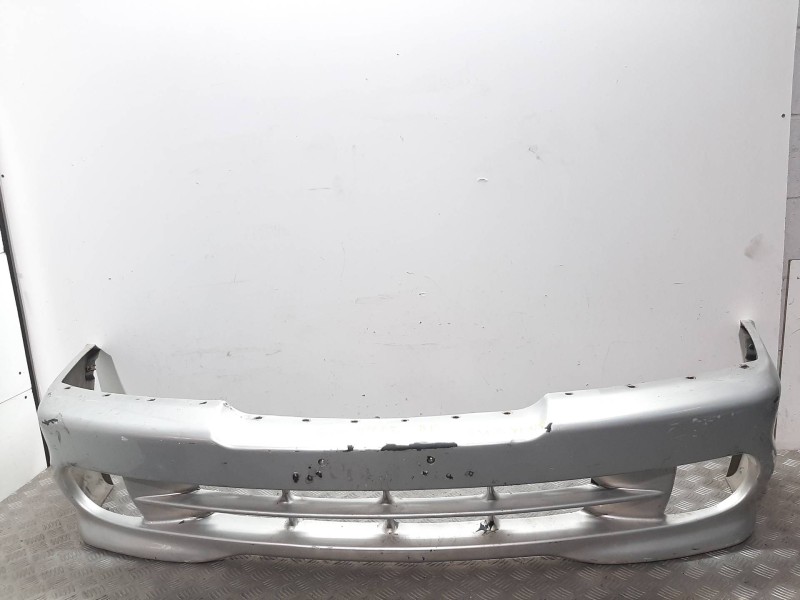 Recambio de paragolpes delantero para ssangyong musso 2.3 tdi referencia OEM IAM  GRIS 