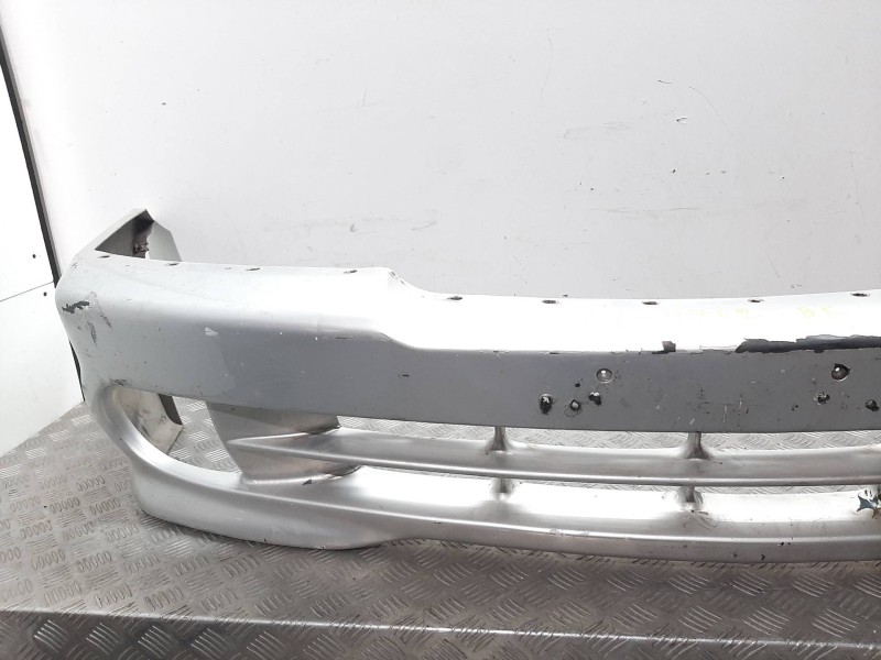 Recambio de paragolpes delantero para ssangyong musso 2.3 tdi referencia OEM IAM  GRIS 