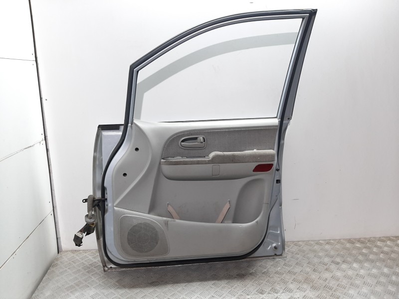 Recambio de puerta delantera derecha para hyundai trajet (fo) 2.0 gls referencia OEM IAM 760043A021A GRIS 