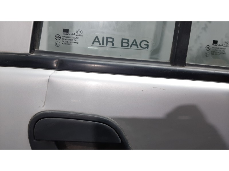 Recambio de puerta trasera derecha para ssangyong musso pick up 2.9 referencia OEM IAM  PLATA 