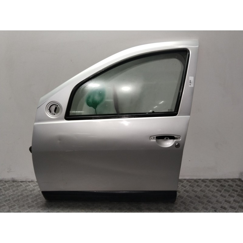 Recambio de puerta delantera izquierda para dacia sandero ambiance referencia OEM IAM 801011499R  PLATA