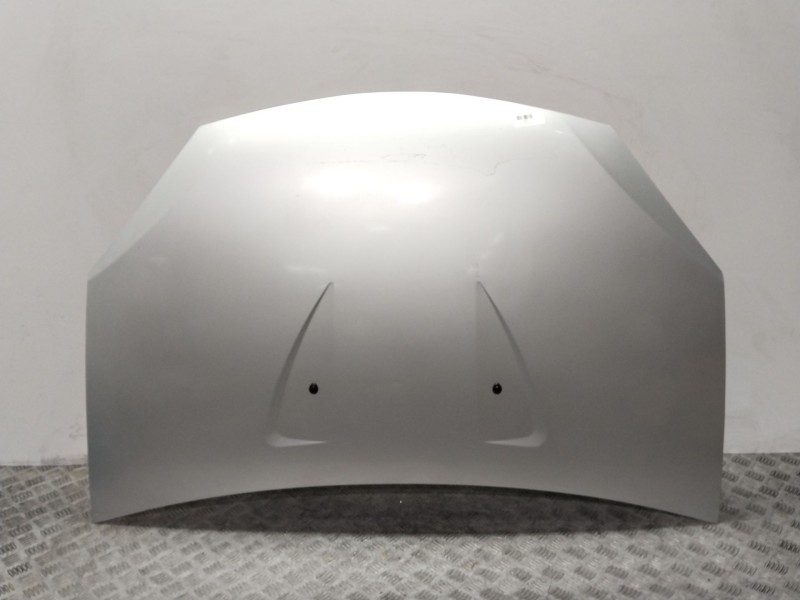 Recambio de capot para dacia sandero ambiance referencia OEM IAM 6001551793  PLATA