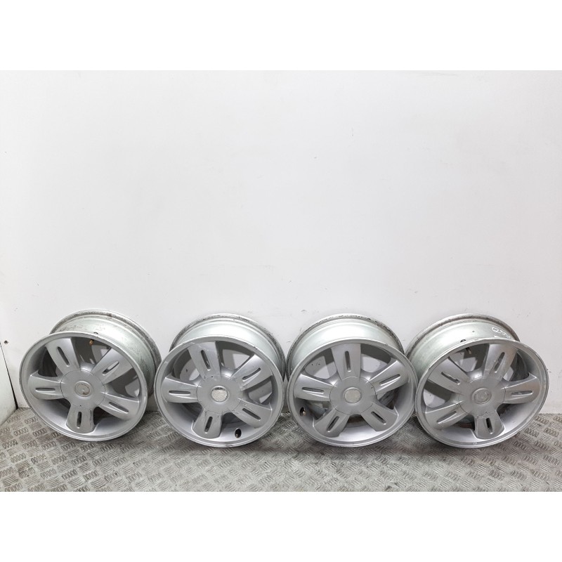 Recambio de juego llantas para bmw mini (r50,r53) one d referencia OEM IAM 6763295  51/2JX15H2