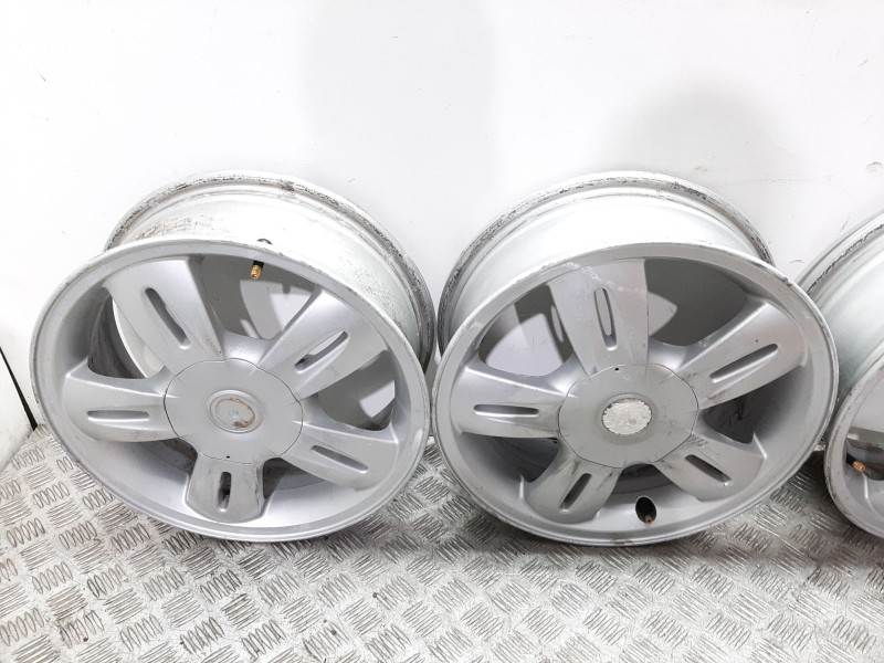 Recambio de juego llantas para bmw mini (r50,r53) one d referencia OEM IAM 6763295  51/2JX15H2