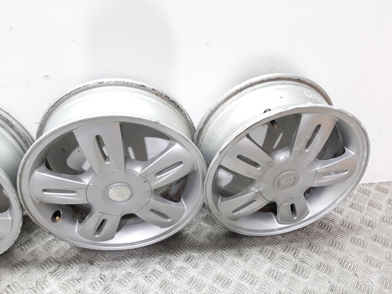 Recambio de juego llantas para bmw mini (r50,r53) one d referencia OEM IAM 6763295  51/2JX15H2