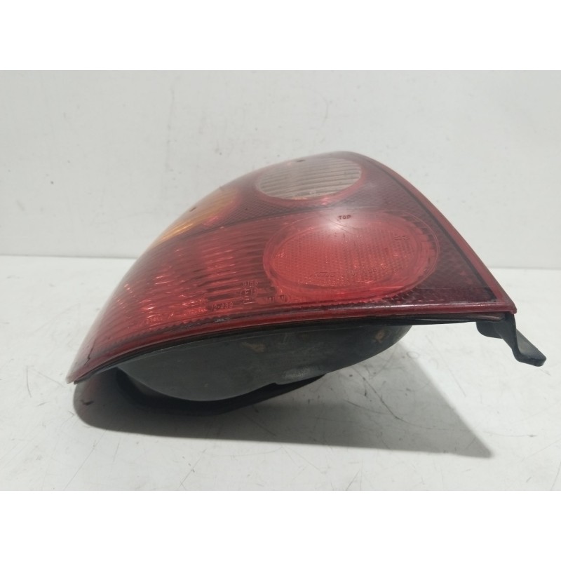 Recambio de piloto trasero izquierdo para toyota corolla (e11) 1.6 linea luna (5-ptas.) referencia OEM IAM 22076587L  