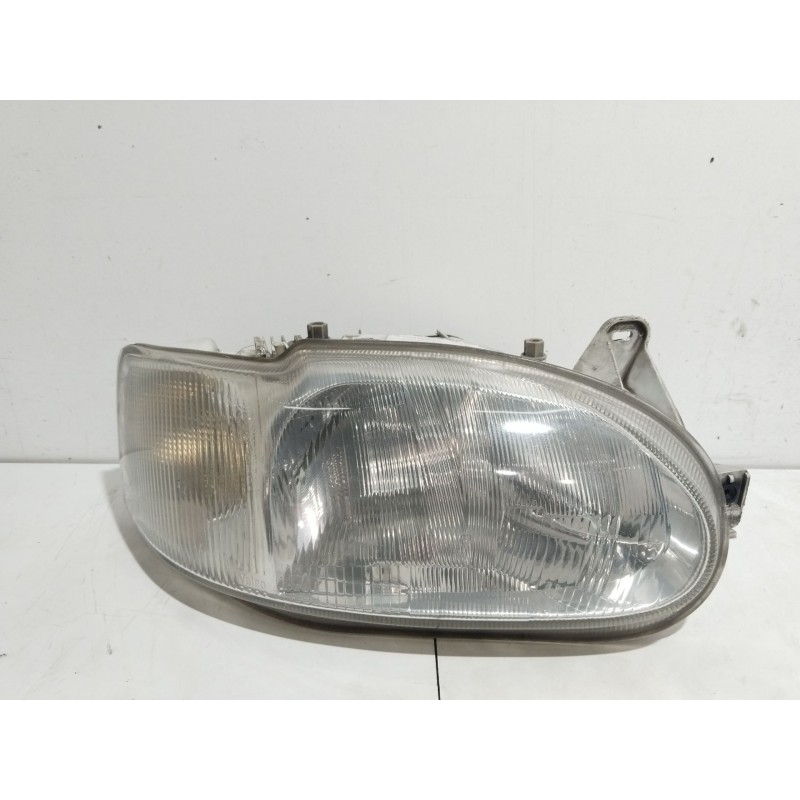 Recambio de faro derecho para ford escort berl./turnier básico berlina referencia OEM IAM 1076554  