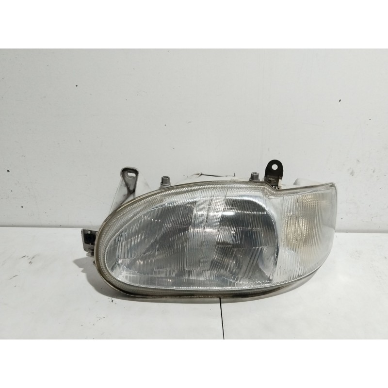 Recambio de faro izquierdo para ford escort berl./turnier clx berlina referencia OEM IAM 1076561  