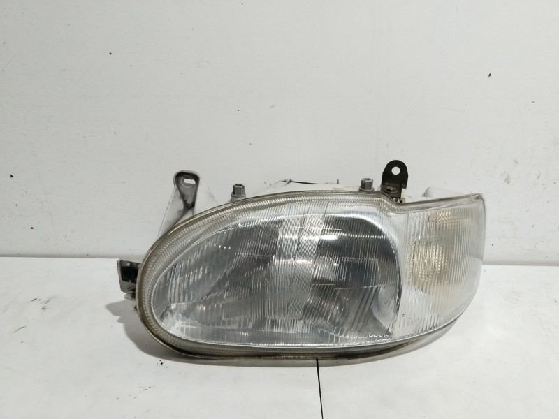 Recambio de faro izquierdo para ford escort berl./turnier clx berlina referencia OEM IAM 1076561  