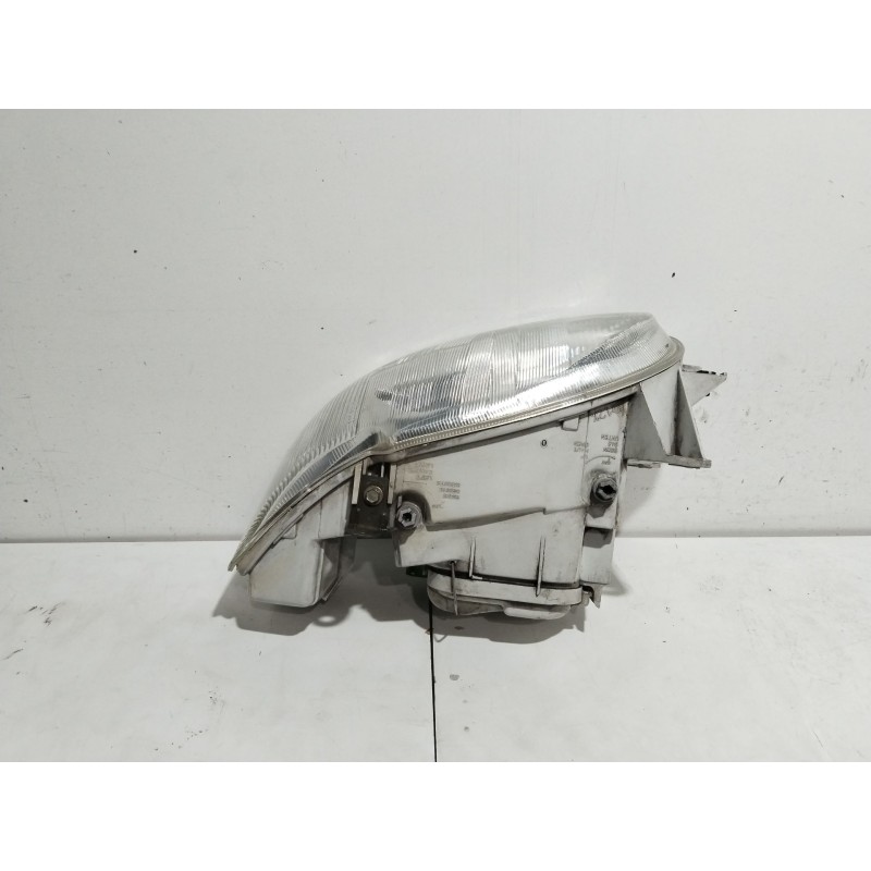 Recambio de faro izquierdo para ford escort berl./turnier clx berlina referencia OEM IAM 1076561  