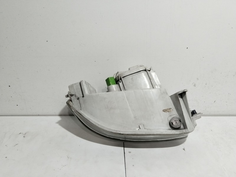 Recambio de faro izquierdo para ford escort berl./turnier clx berlina referencia OEM IAM 1076561  