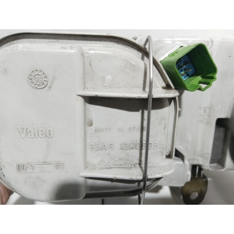 Recambio de faro izquierdo para ford escort berl./turnier clx berlina referencia OEM IAM 1076561  