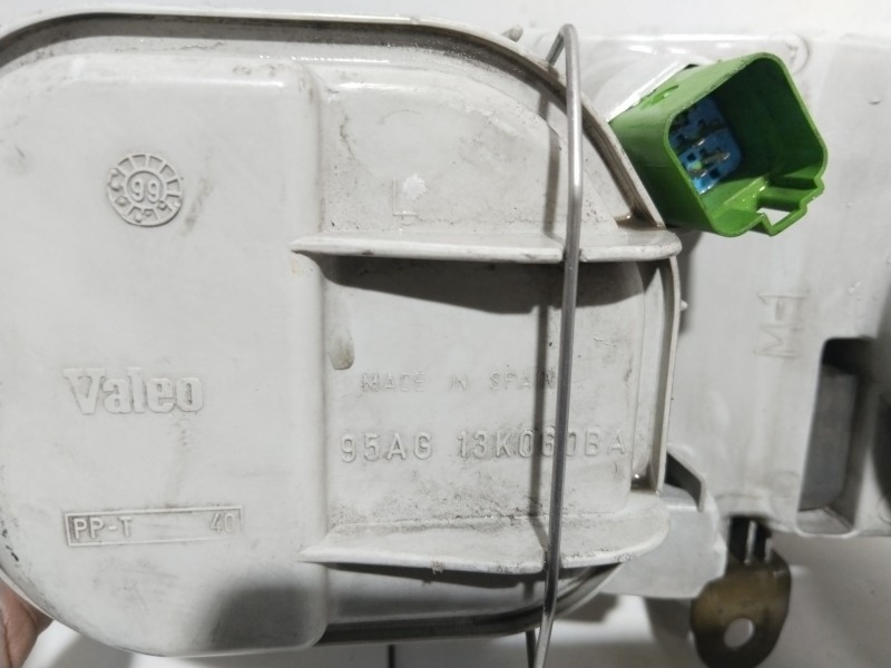 Recambio de faro izquierdo para ford escort berl./turnier clx berlina referencia OEM IAM 1076561  