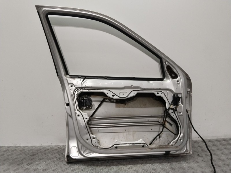 Recambio de puerta delantera izquierda para seat leon (1m1) 1.6 16 v referencia OEM IAM 1M0831055M  PLATA