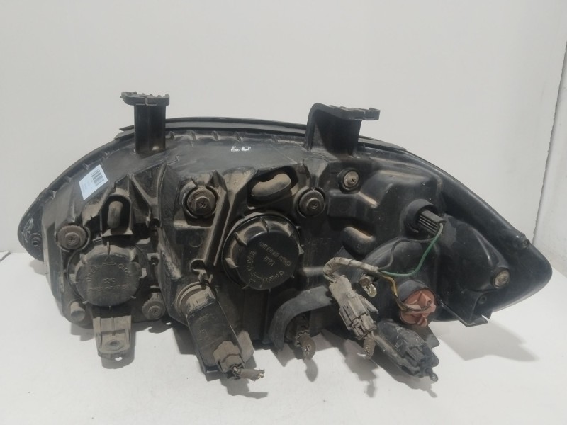 Recambio de faro derecho para ssangyong rodius i 2.7 xdi referencia OEM IAM 8310121303  