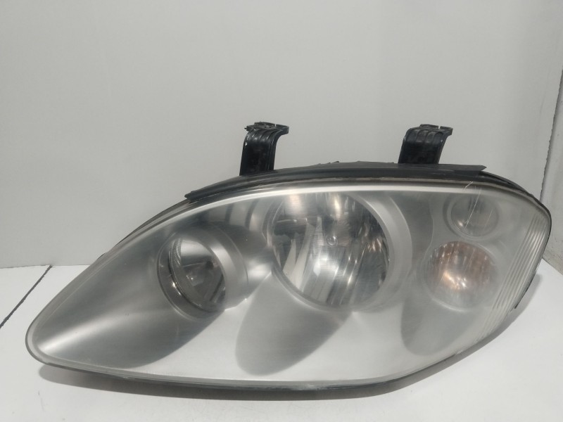 Recambio de faro izquierdo para ssangyong rodius i 2.7 xdi referencia OEM IAM 8310121201  