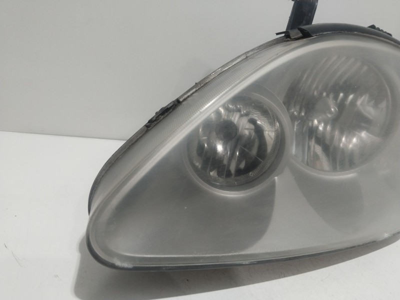 Recambio de faro izquierdo para ssangyong rodius i 2.7 xdi referencia OEM IAM 8310121201  
