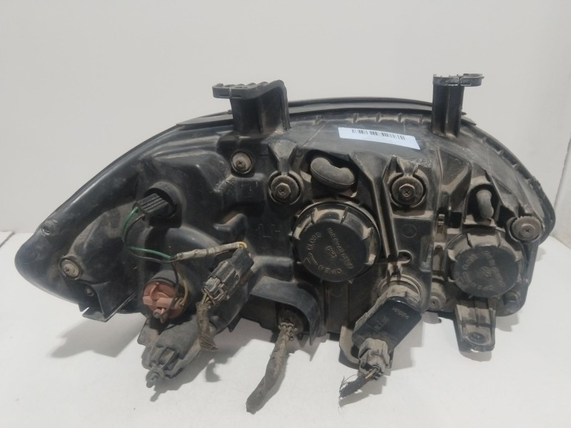 Recambio de faro izquierdo para ssangyong rodius i 2.7 xdi referencia OEM IAM 8310121201  
