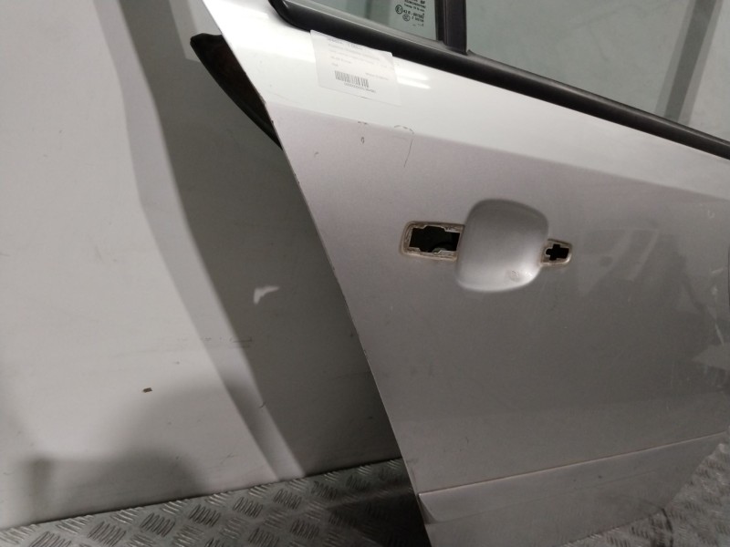 Recambio de puerta trasera derecha para opel astra h berlina cosmo referencia OEM IAM  PLATA 