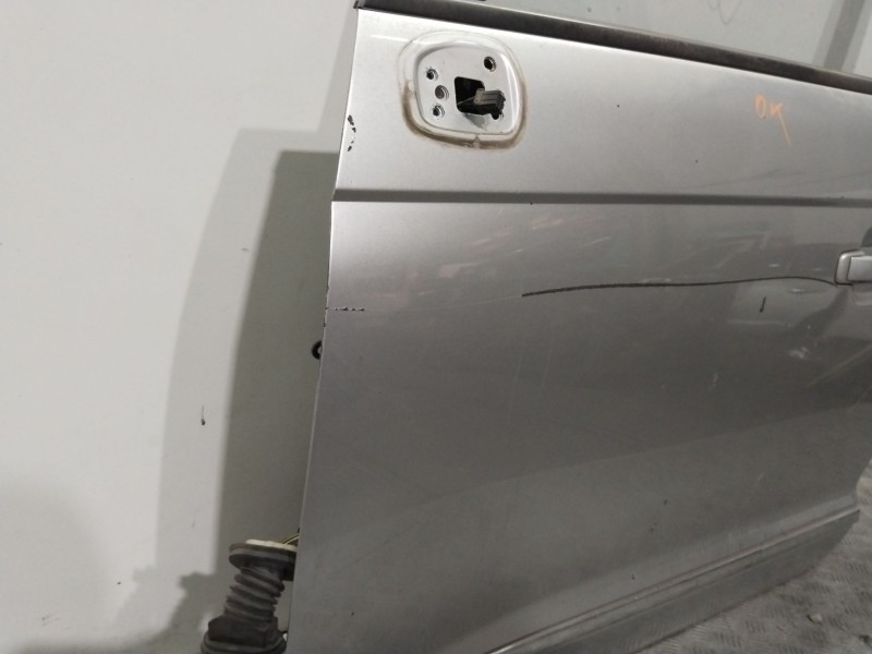 Recambio de puerta delantera izquierda para ssangyong rodius i 2.7 xdi referencia OEM IAM 6200321202  