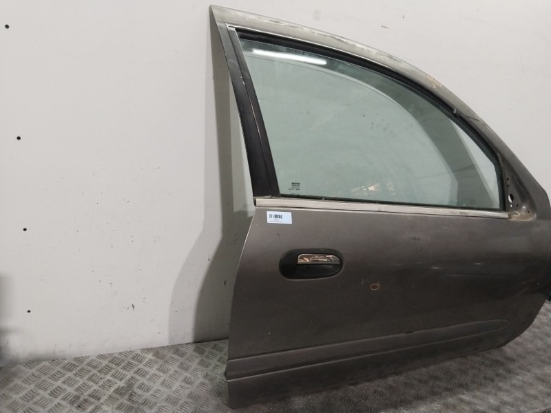 Recambio de puerta delantera derecha para nissan almera ii hatchback (n16) 1.5 referencia OEM IAM 801005M332  