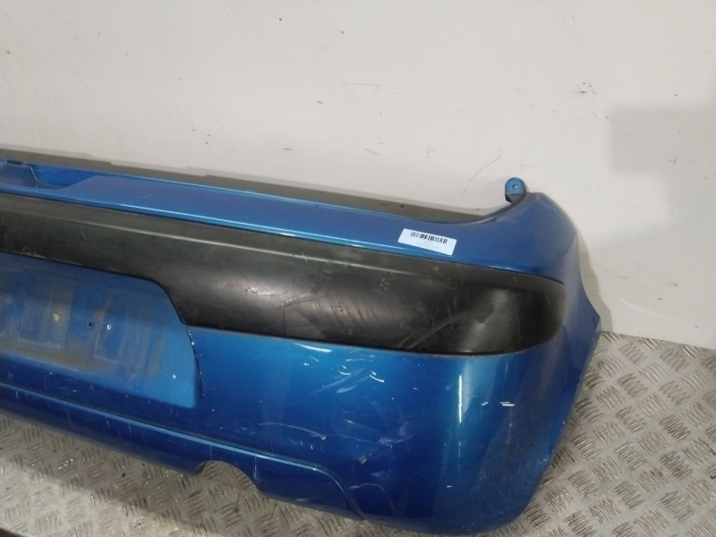 Recambio de paragolpes trasero para ford fusion (ju_) 1.6 tdci referencia OEM IAM 1324511  