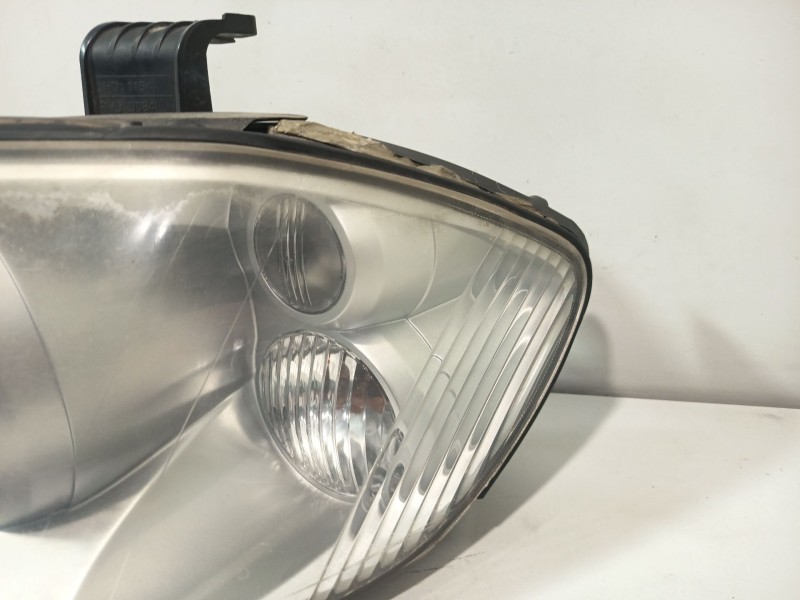 Recambio de faro izquierdo para ssangyong rodius i 2.7 xdi referencia OEM IAM 8310121201  