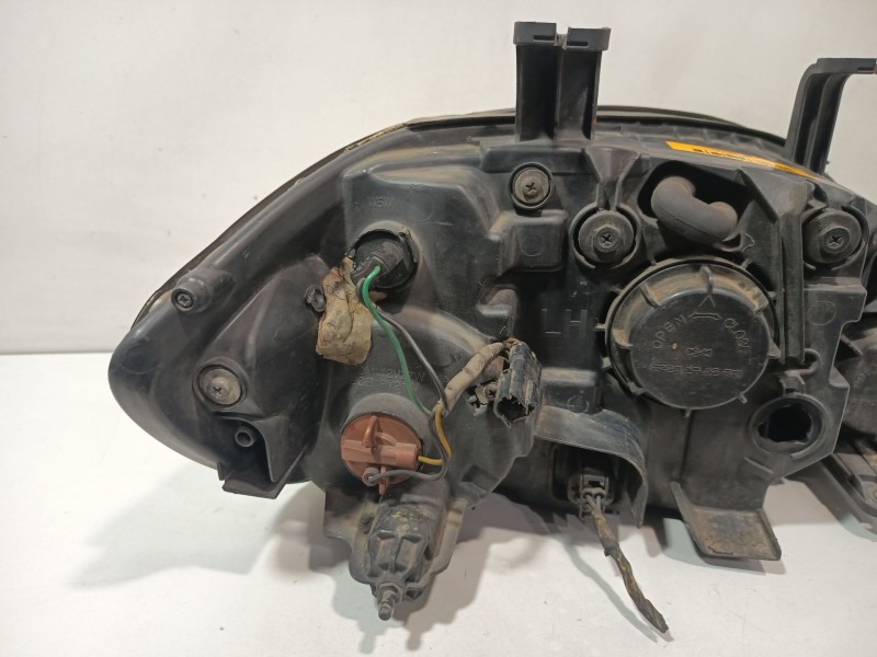 Recambio de faro izquierdo para ssangyong rodius i 2.7 xdi referencia OEM IAM 8310121201  