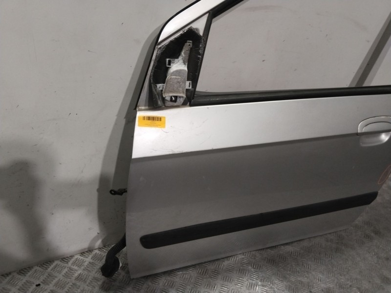 Recambio de puerta delantera izquierda para hyundai getz (tb) 1.1 referencia OEM IAM 760031C020  